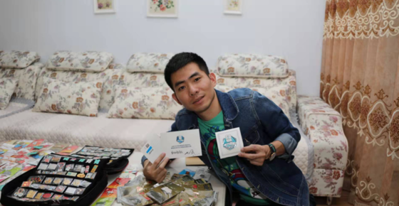 志愿者任磊有個“小驕傲”——持有北京冬奧會紀念徽章“0001 號”